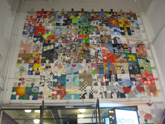 puzzle art installation and collaborative project chelsea market tim kelly artists and fleas indie art market nyc art